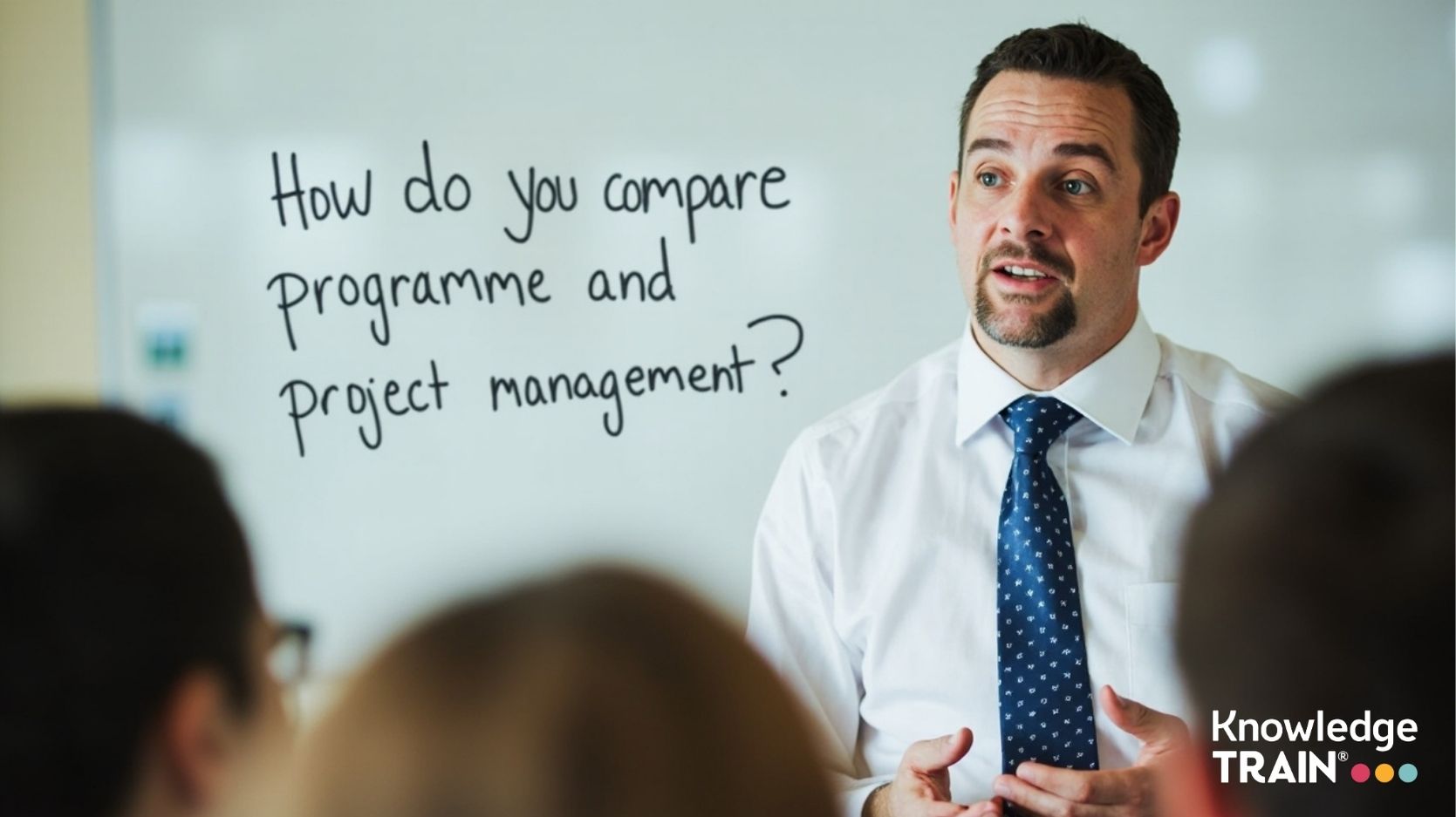 How do you compare programme and project management?